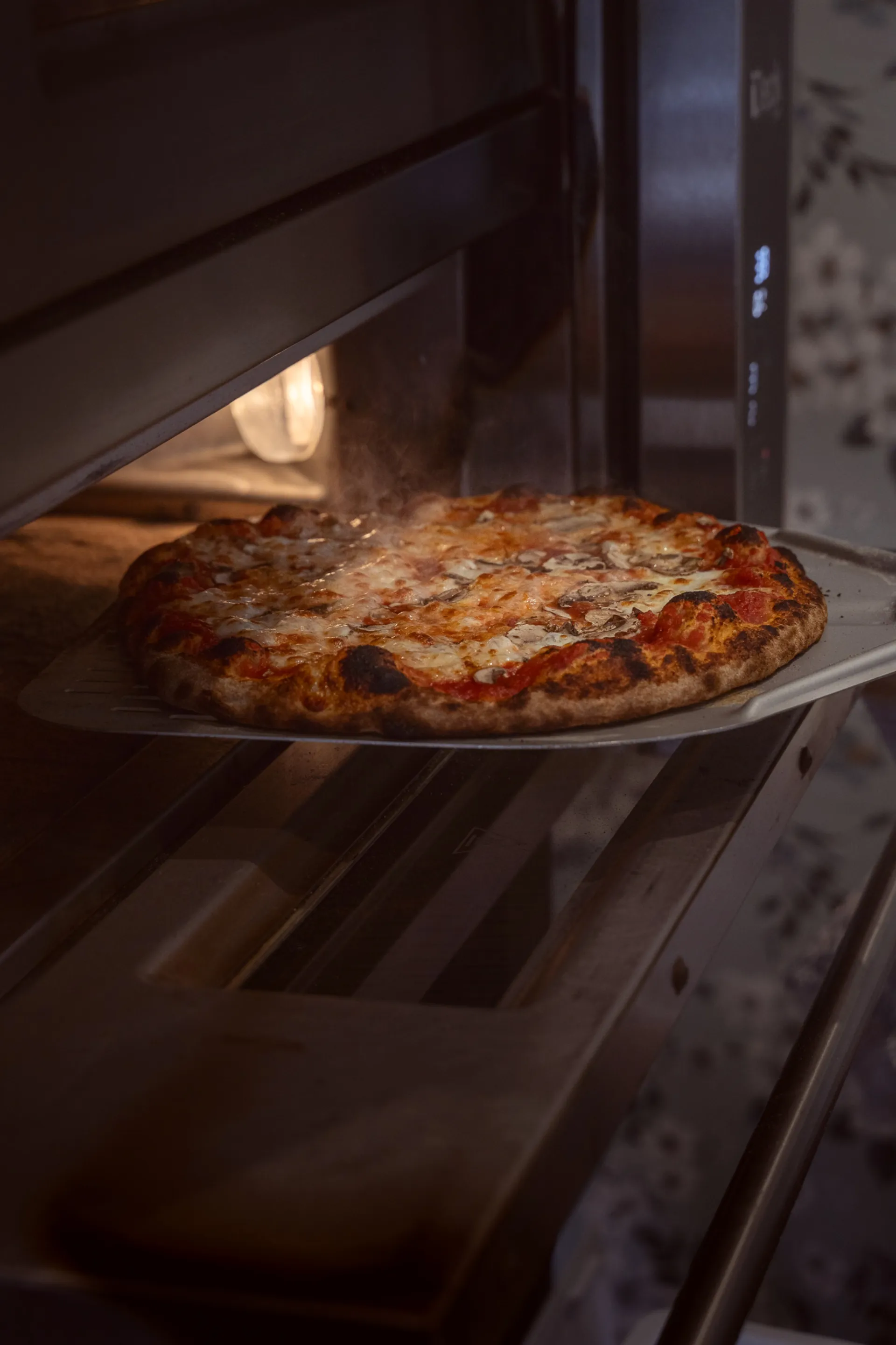 Pizza sortie du four